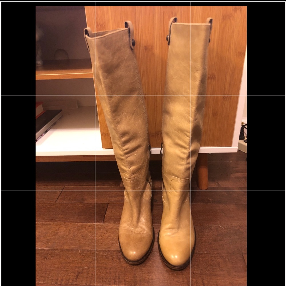 vintage leather knee-high boots with wood heel.